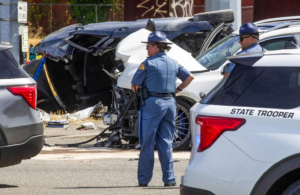 First responders investigate a crash that left six dead and three others injured July 16, 2023, in Tacoma. (Luke Johnson / The Seattle Times