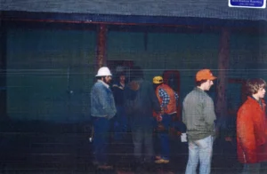 Photo of Men in Front on Shop